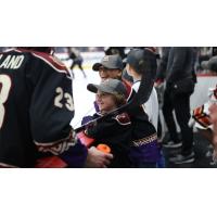 Tucson Roadrunners share a laugh with young fans