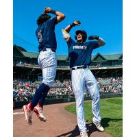 Somerset Patriots center fielder Spencer Jones (right) celebrates his homer