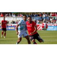 Cavalry FC midfielder Sergio Camargo (right)