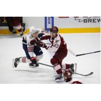 Peterborough Petes centre Jonathan Melee (right) vs. the Oshawa Generals