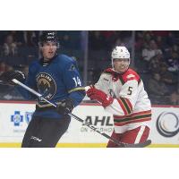 Grand Rapids Griffins defenseman Eemil Viro (right) vs. the Cleveland Monsters