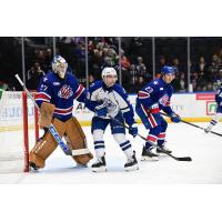 Rochester Americans' Devon Levi and Ryan Johnson and Syracuse Crunch's Conor Sheary on game night