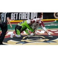 Albany Firewolves defenseman Joe Nardella (right) faces off with the Saskatchewan Rush