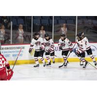 Rapid City Rush gather after scoring a goal