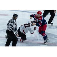 Allen Americans left wing Will Gavin (right) fights the Rapid City Rush