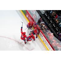 Spokane Chiefs gather after a goal