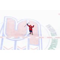 Shea Van Olm of the Spokane Chiefs celebrates at mid-ice