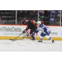 Lehigh Valley Phantoms' Rhett Gardner and Syracuse Crunch's Derrick Pouliot in action