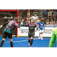 St. Louis Ambush forward Robert Kristo (left) congratulates William Eskay