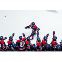 Saginaw Spirit right wing Dimian Zhilkin is saluted by teammates