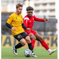 Robbie Mertz of Pittsburgh Riverhounds SC (left) vs. Loudoun United