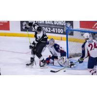 Wichita Thunder's Jay Dickman battles Tulsa Oilers' Talyn Boyko