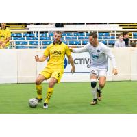 Milwaukee Wave forward Derek Huffman with possession