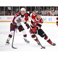 Peterborough Petes left wing Caden Taylor (left) vs. the Ottawa 67's