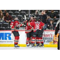 Tucson Roadrunners forward Curtis Douglas (middle) celebrates after scoring his fourth goal of the season