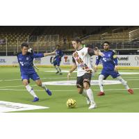 Josh Hughes of the Baltimore Blast maintains possession vs. the Orlando Seawolves