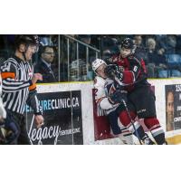 Vancouver Giants defenceman Bowen Byram crushes a member of the Kamloops Blazers
