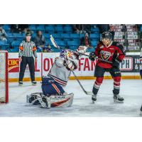Vancouver Giants forward Justin Sourdif tests the Kamloops Blazers goaltender