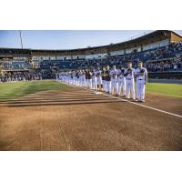 Rome Emperors line up for the national anthem