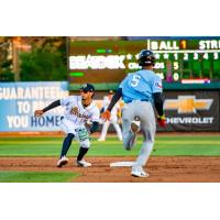 Charleston RiverDogs shortstop Ricardo Gonzalez prepare to field a throw