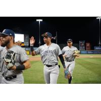 Dylan Jasso of the Somerset Patriots exchanges high fives