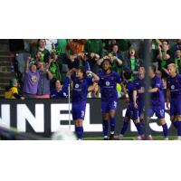 Louisville City FC plays to the crowd following a goal